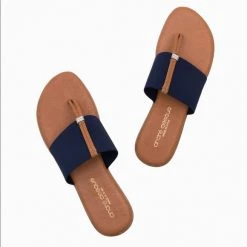 Andre Assous Shoes The Elastic Thong Sandal In Navy